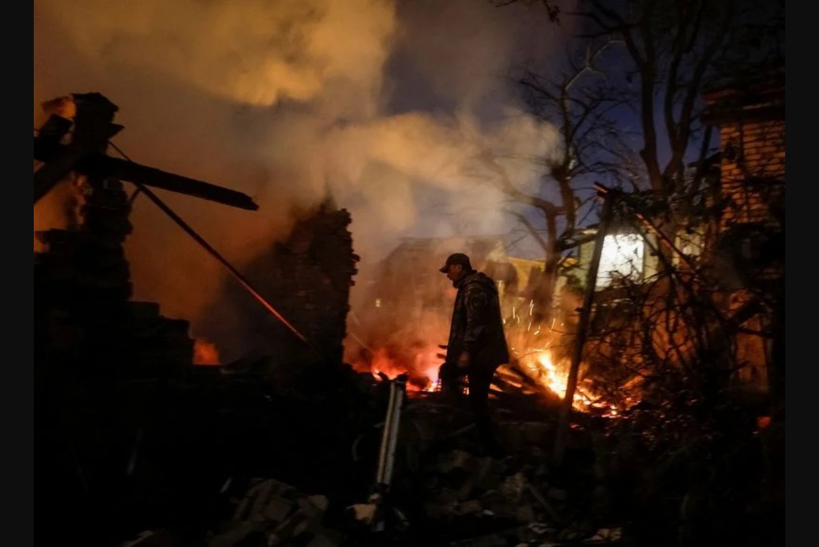 Widespread strikes on Ukraine's power network shroud Kyiv in smoke and force emergency outages