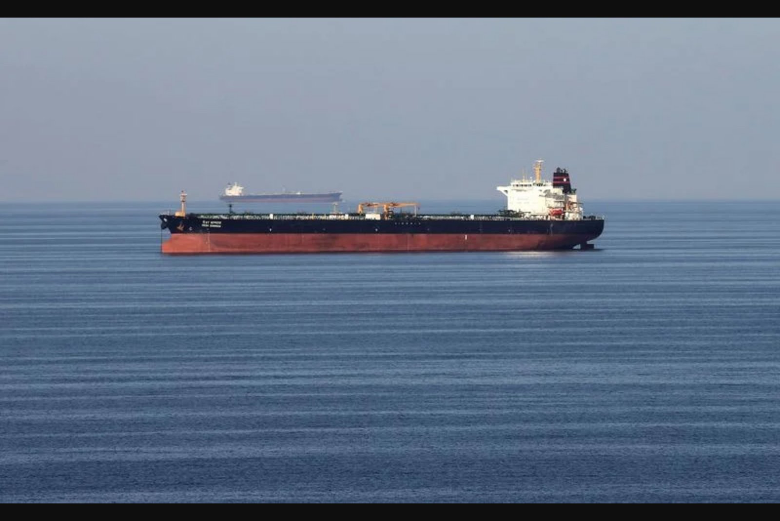 Oil inches higher as questions persist over Strait of Hormuz access