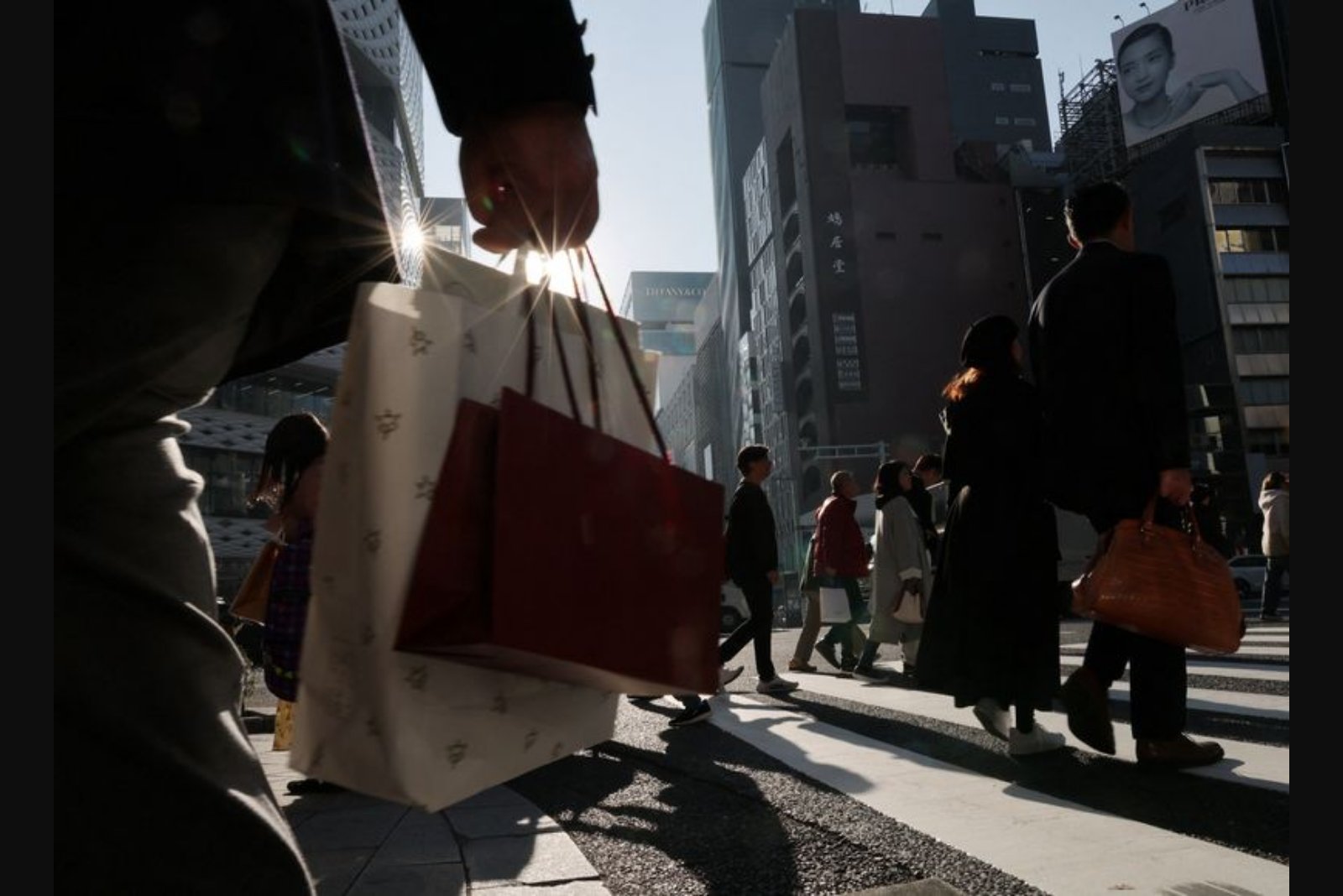 Japan maintains view of a moderate recovery, flags Middle East tensions and market swings as risks