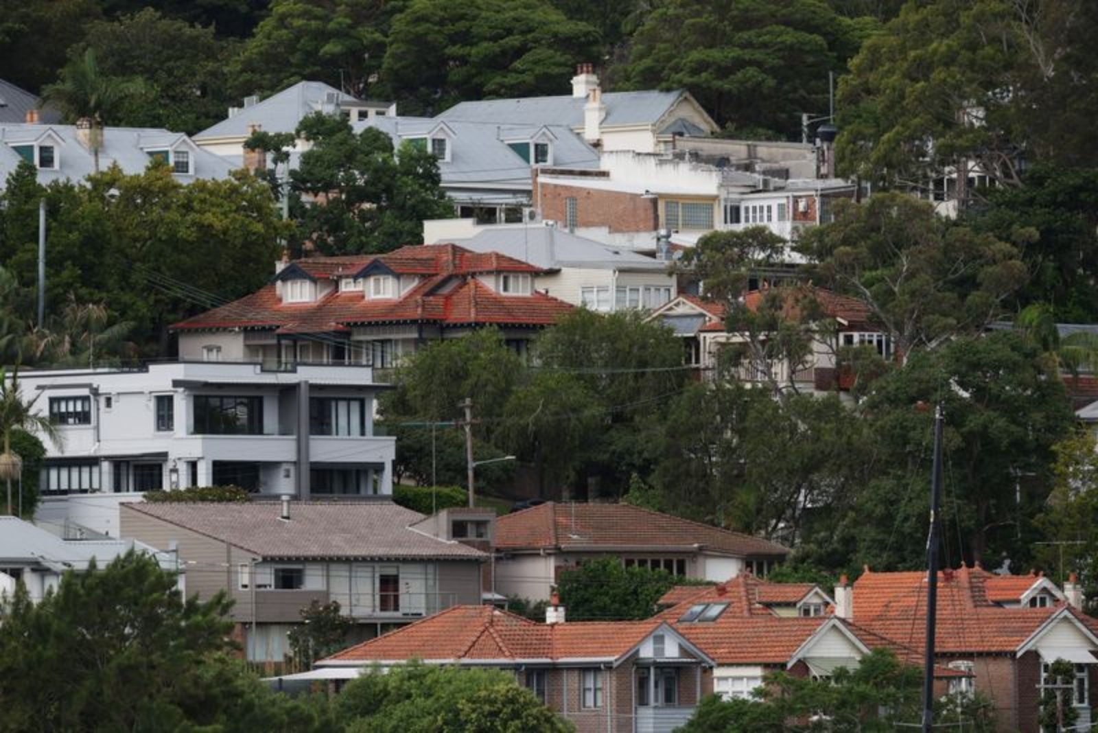 Australian Home Price Gains Slow to Year-Long Low as Sydney and Melbourne Fall
