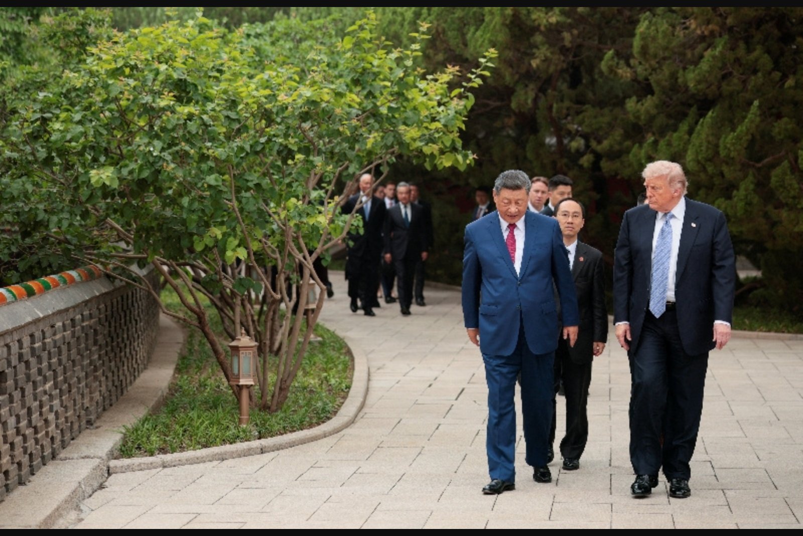 Xi Escorts Trump Through Zhongnanhai Gardens, Showcasing Centuries-Old Trees