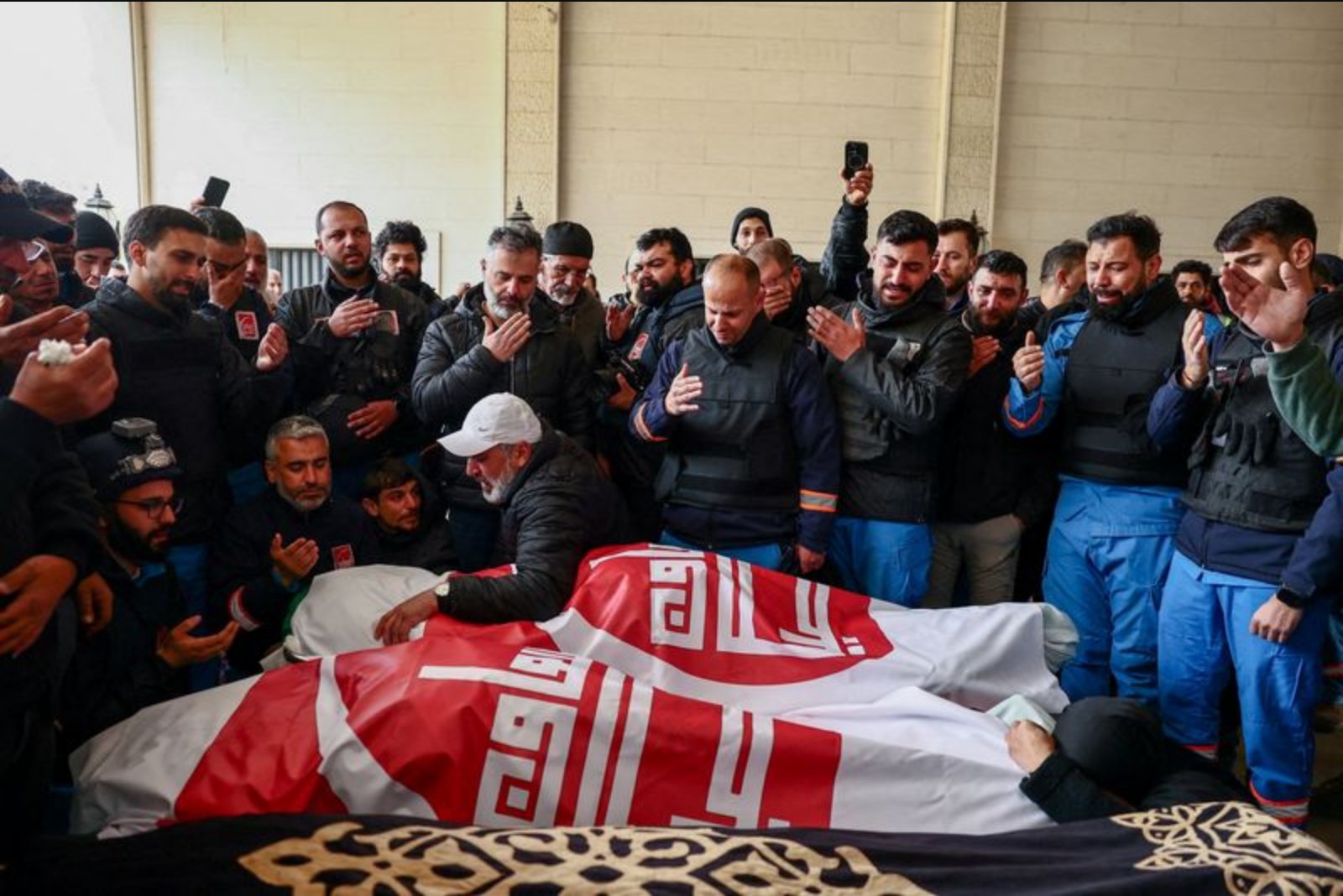Lebanese Paramedics Mourn Colleagues Killed in Israeli Strike as Rescue Work Continues